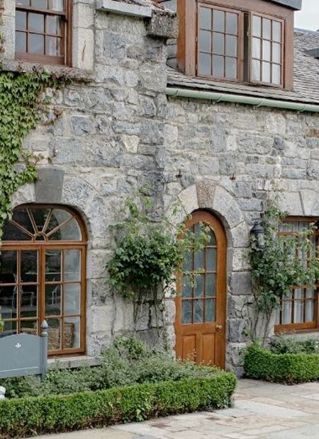 Country estate in sandstone with bicycles
