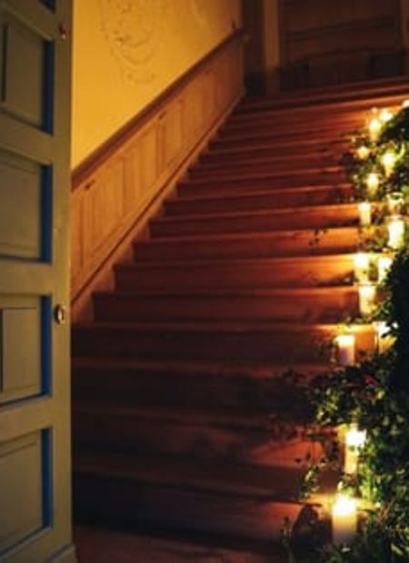Country house christmas lighting on stairwell