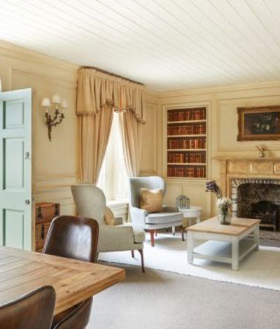 Vintage lounge room and library in irish cottage