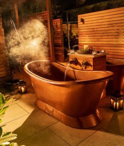 Copper outdoor bathtub and tiles floors