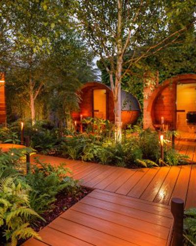 Outdoor saunas and wooden walkways at luxury spa