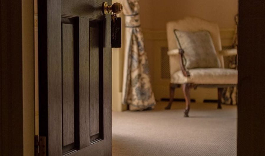 Looking inside a hotel suite from the doorway