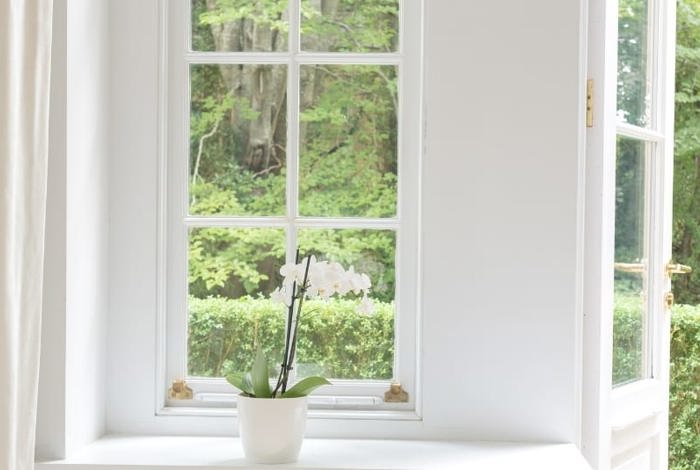 White window frame and green garden at luxury 4 star hotel