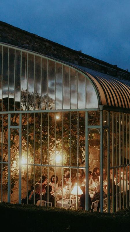 Luxury atrium wedding venue night time lights