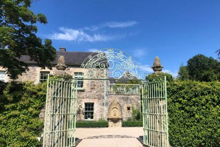 Meal archway entrance to country house hotel