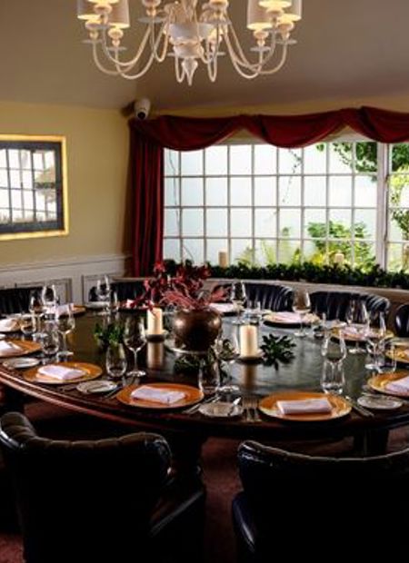 Country house dining room with leather seating