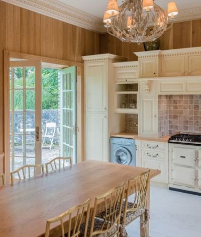 Traditional kitchen with timber finishing and coal oven
