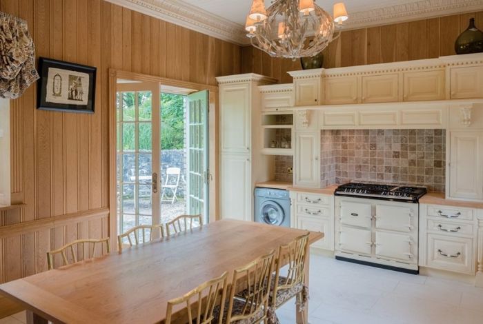 Traditional kitchen with timber finishing and coal oven