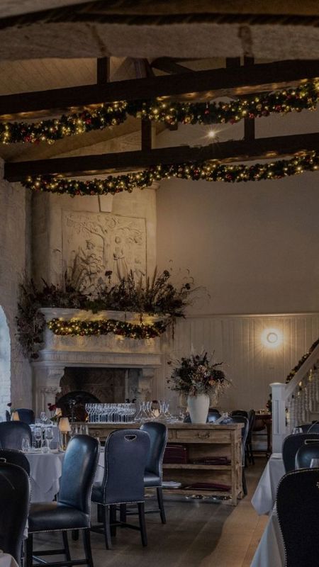High ceiling dining room with wooden beams and christmas decorations at country estate co kildare