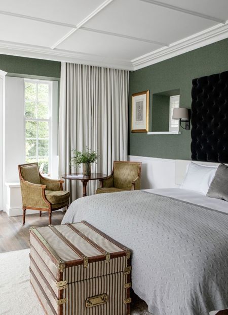 Lily Pond elegant hotel suite internal view of bed with white linen