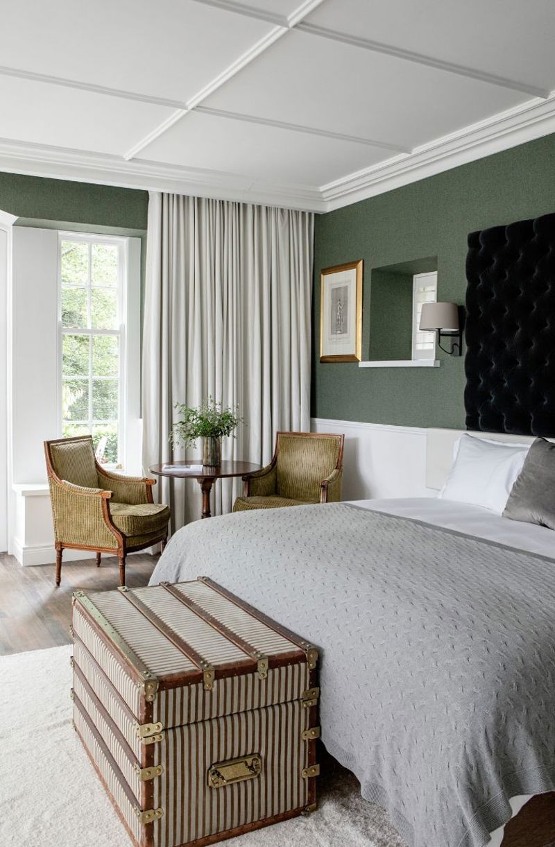 Lily Pond elegant hotel suite internal view of bed with white linen