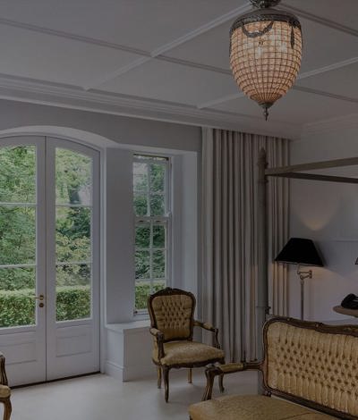 Internal view of luxury hotel room with classic furniture