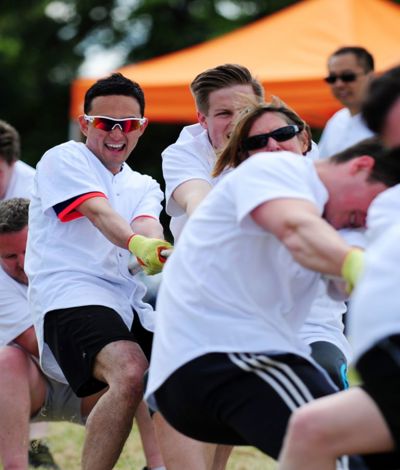 Team building tug of war activity for corporate activities