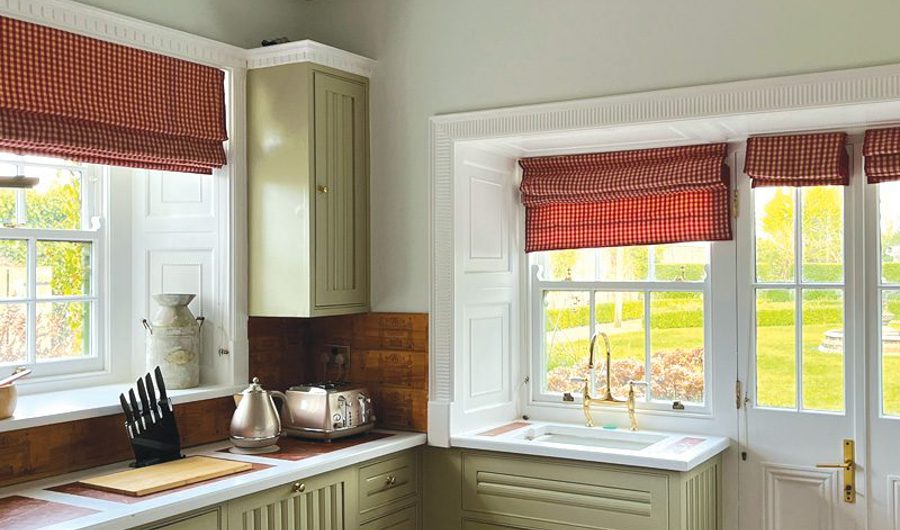 Large traditional kitchen in self catered cottage with garden views