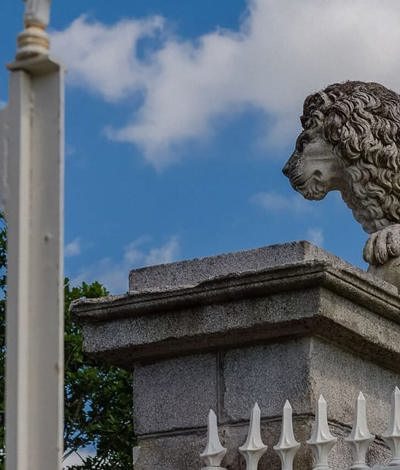 Irish country house gates with lion sculpture
