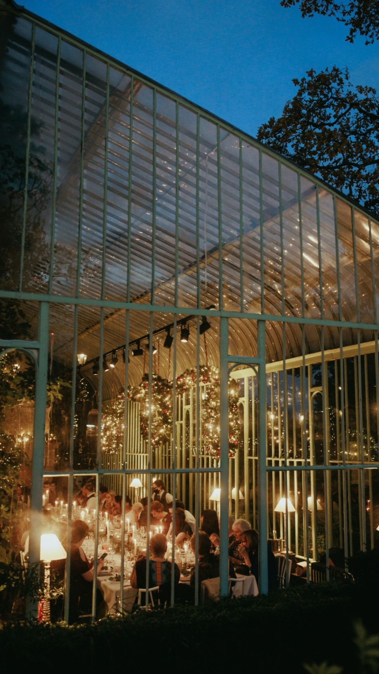 The Orangery, a light-filled glass conservatory decked for Christmas in fairy lights and wreaths of holly at Cliff at Lyons, a boutique hotel and country retreat located just 30 minutes from Dublin